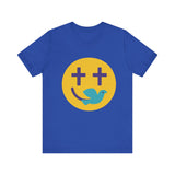 Woman wearing a navy Christian t-shirt with a smiley face design featuring purple cross eyes and a blue dove forming the smile.