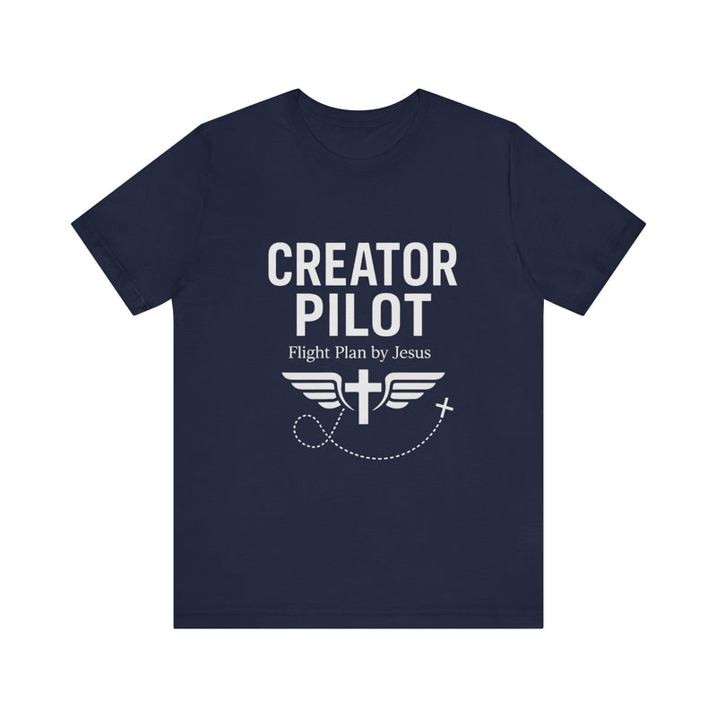 Faith-based t-shirt with “Creator Pilot” text, flight emblem with cross and wings, Christian apparel for Kingdom creators.