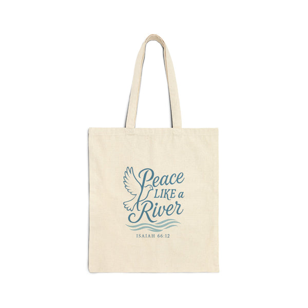 Peace Like a River” tote bag with dove illustration forming the ‘P’ in Peace, blue flowing river lines, and Isaiah 66:12 scripture text.