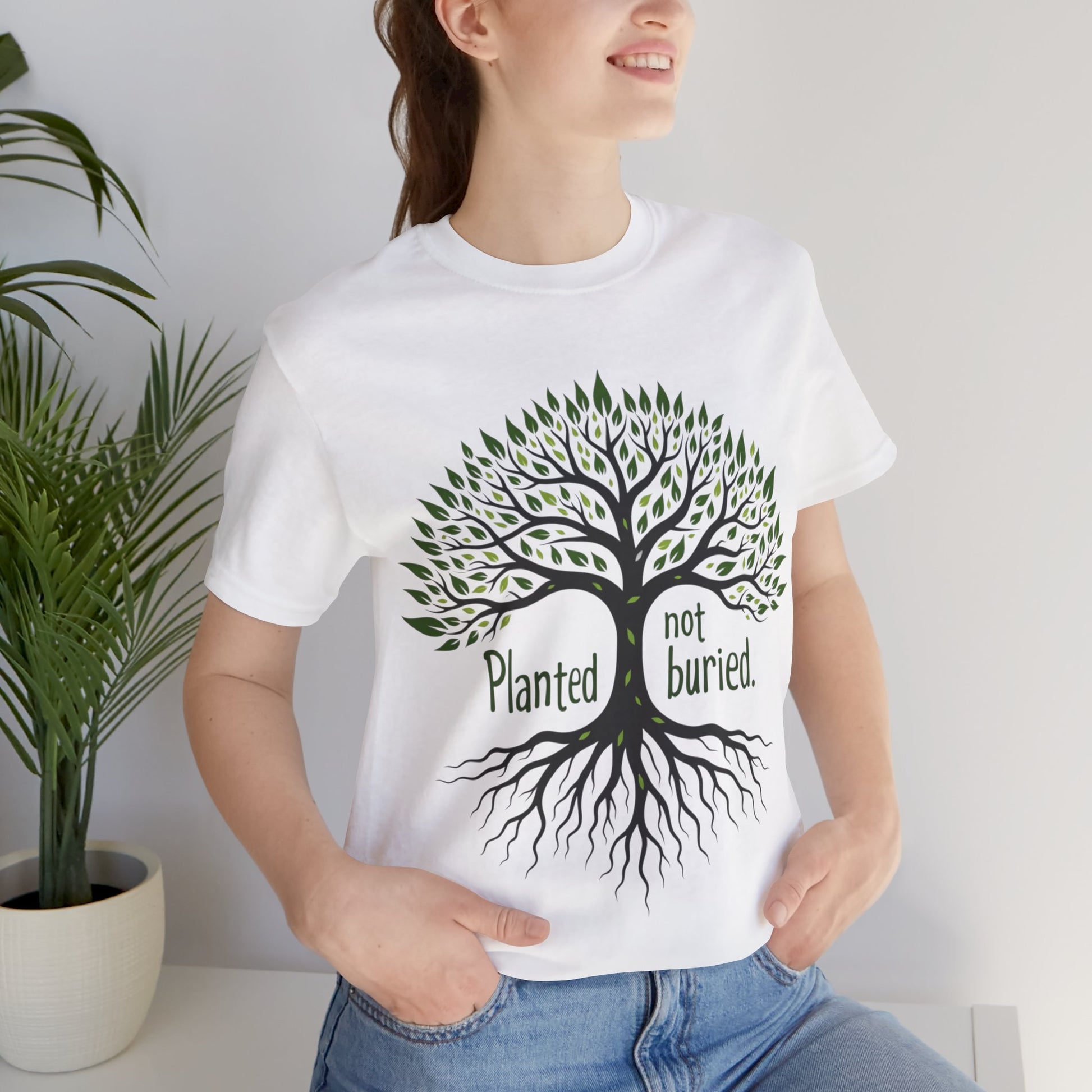 "Christian shirt with the phrase 'Planted Not Buried' in earthy tones, symbolizing spiritual growth and divine purpose."