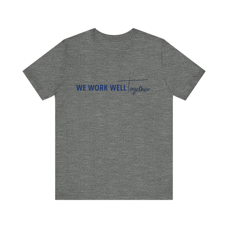 Typography shirt design reading “We Work Well Together” with a cross-inspired T, representing unity with Jesus.