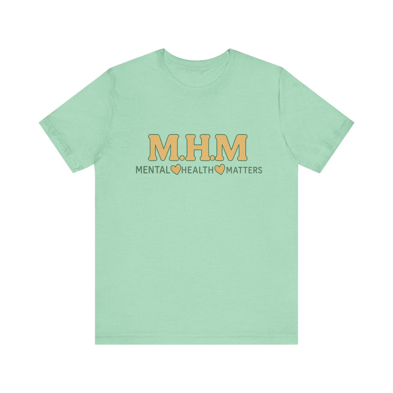 Shirt design featuring the bold acronym M.H.M with the full text “Mental Health Matters” in modern, expressive lettering.