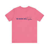 Typography shirt design reading “We Work Well Together” with a cross-inspired T, representing unity with Jesus.