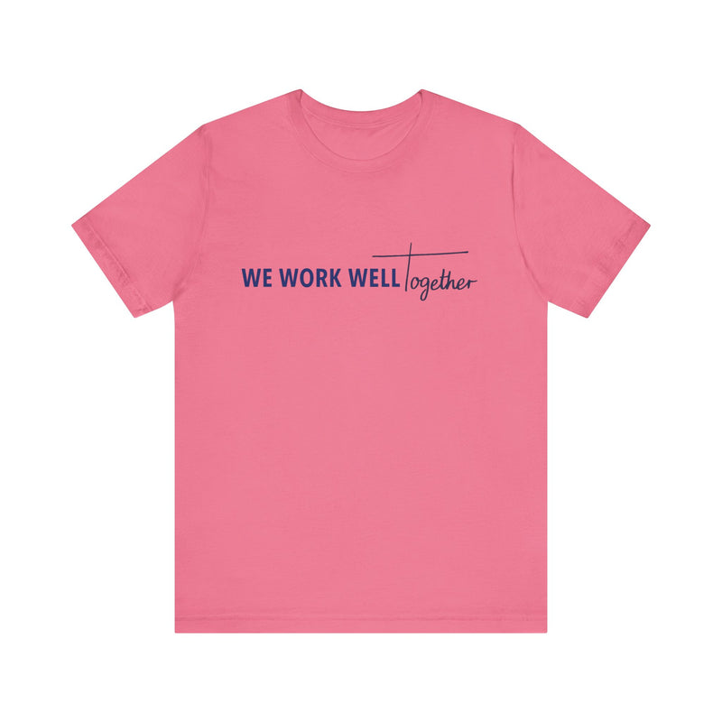 Typography shirt design reading “We Work Well Together” with a cross-inspired T, representing unity with Jesus.