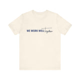 Typography shirt design reading “We Work Well Together” with a cross-inspired T, representing unity with Jesus.