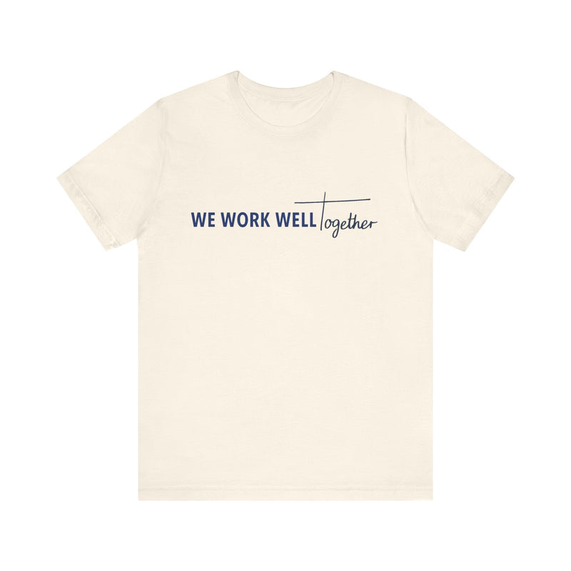 Typography shirt design reading “We Work Well Together” with a cross-inspired T, representing unity with Jesus.