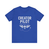Faith-based t-shirt with “Creator Pilot” text, flight emblem with cross and wings, Christian apparel for Kingdom creators.