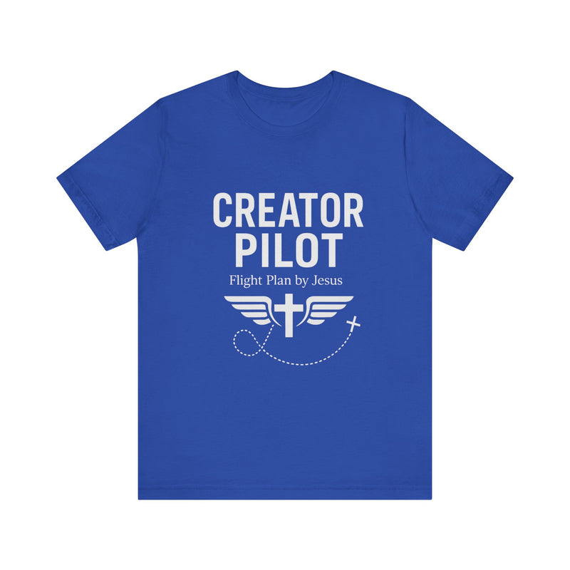 Faith-based t-shirt with “Creator Pilot” text, flight emblem with cross and wings, Christian apparel for Kingdom creators.