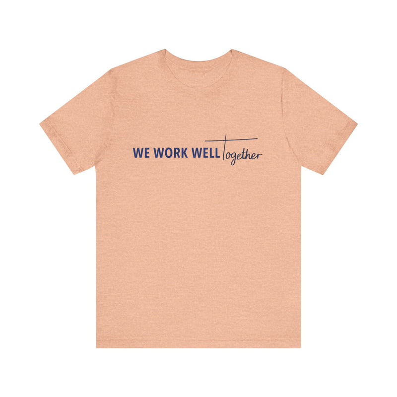 Typography shirt design reading “We Work Well Together” with a cross-inspired T, representing unity with Jesus.