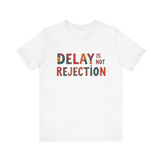 Faith-based apparel with 'Delay is not rejection' text – spiritual encouragement design by Klippette"

