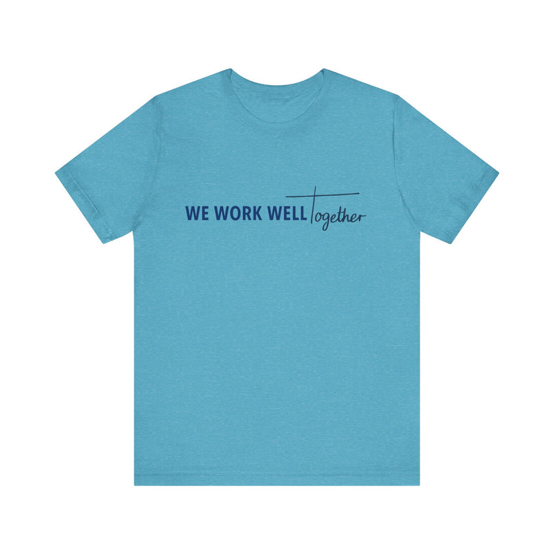 Typography shirt design reading “We Work Well Together” with a cross-inspired T, representing unity with Jesus.
