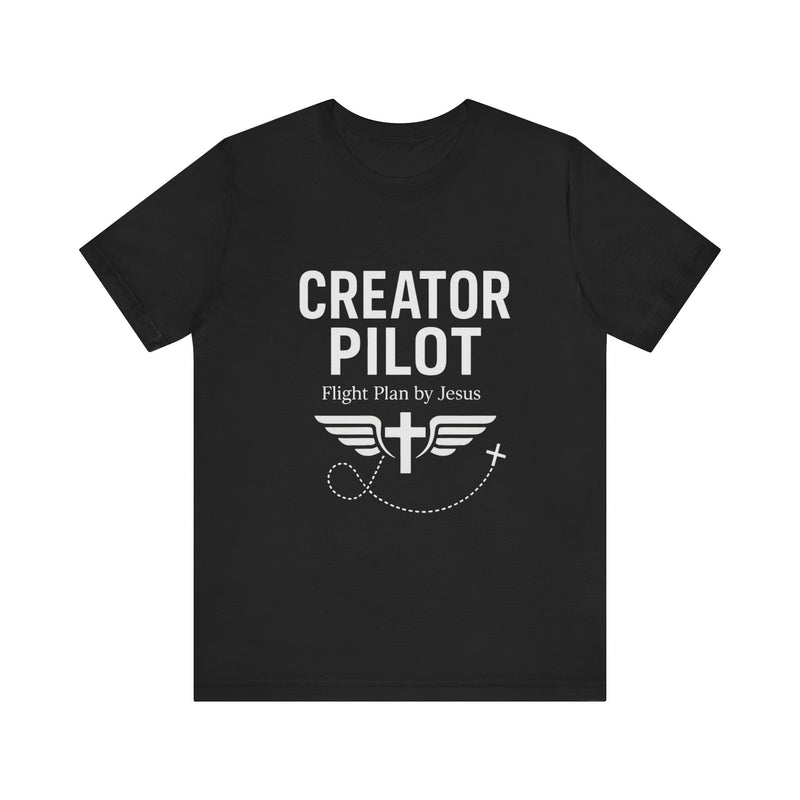 Faith-based t-shirt with “Creator Pilot” text, flight emblem with cross and wings, Christian apparel for Kingdom creators.