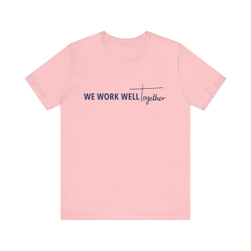 Typography shirt design reading “We Work Well Together” with a cross-inspired T, representing unity with Jesus.
