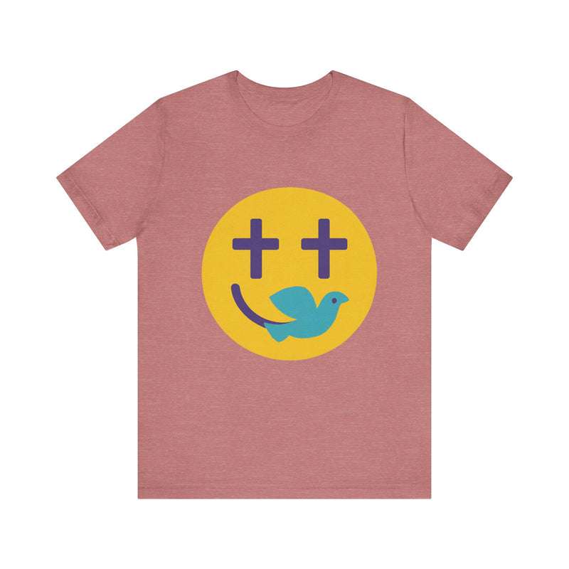Woman wearing a navy Christian t-shirt with a smiley face design featuring purple cross eyes and a blue dove forming the smile.