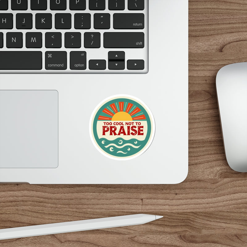 Laptop with a sticker on a wooden desk
