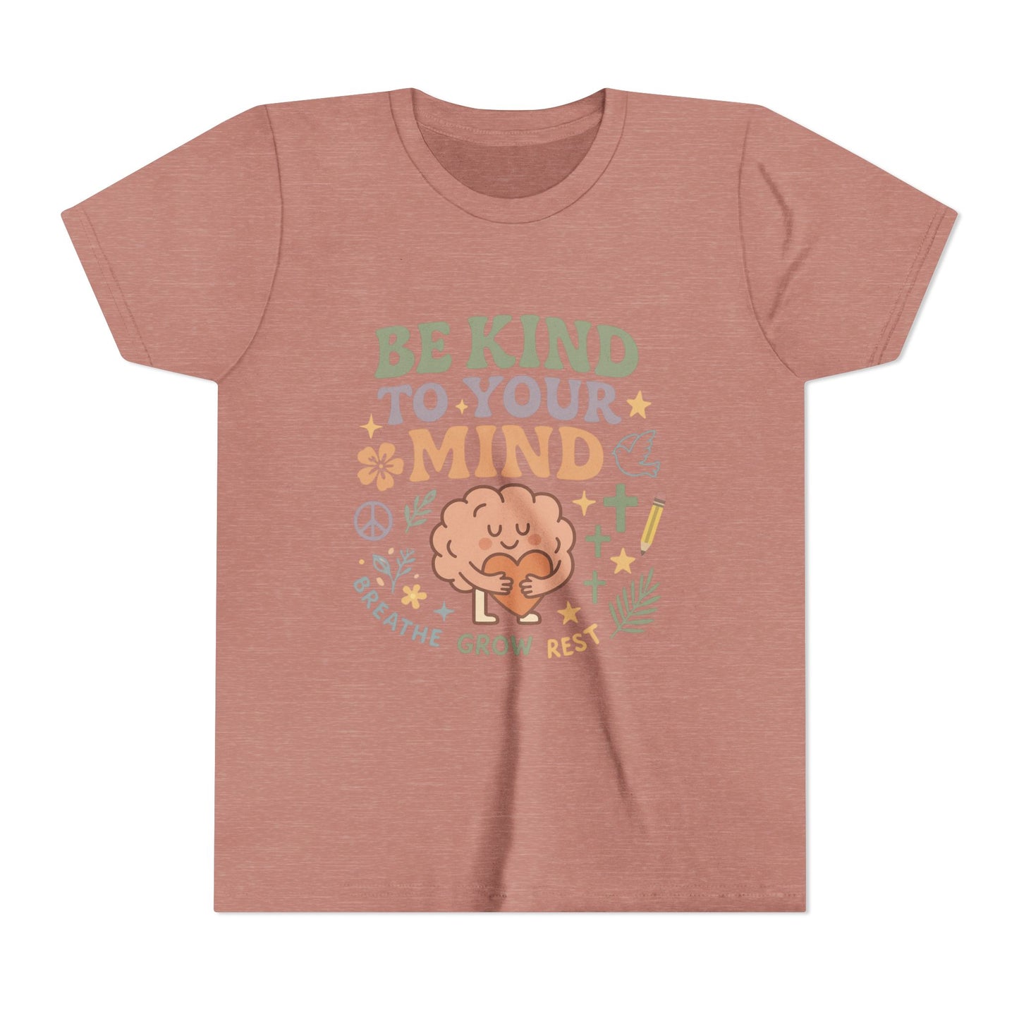 Retro-style t-shirt with “Be Kind to Your Mind” text, featuring a smiling cartoon brain hugging a heart, surrounded by peaceful doodles and affirmations like “Breathe,” “Grow,” and “Rest.”