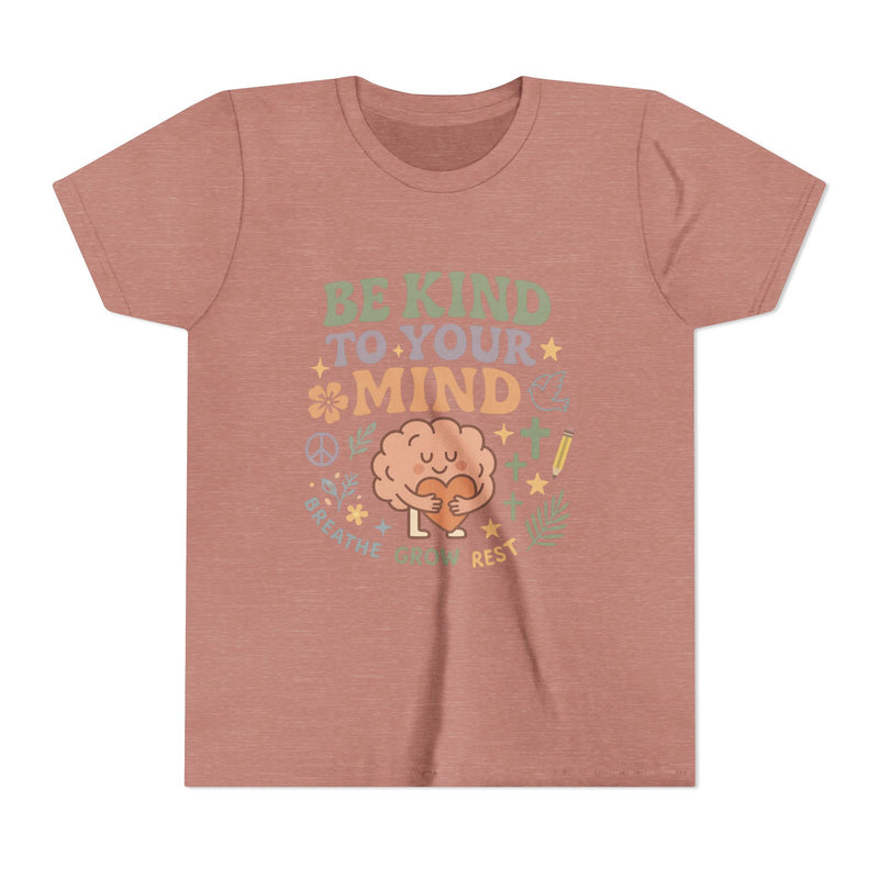 Retro-style t-shirt with “Be Kind to Your Mind” text, featuring a smiling cartoon brain hugging a heart, surrounded by peaceful doodles and affirmations like “Breathe,” “Grow,” and “Rest.”