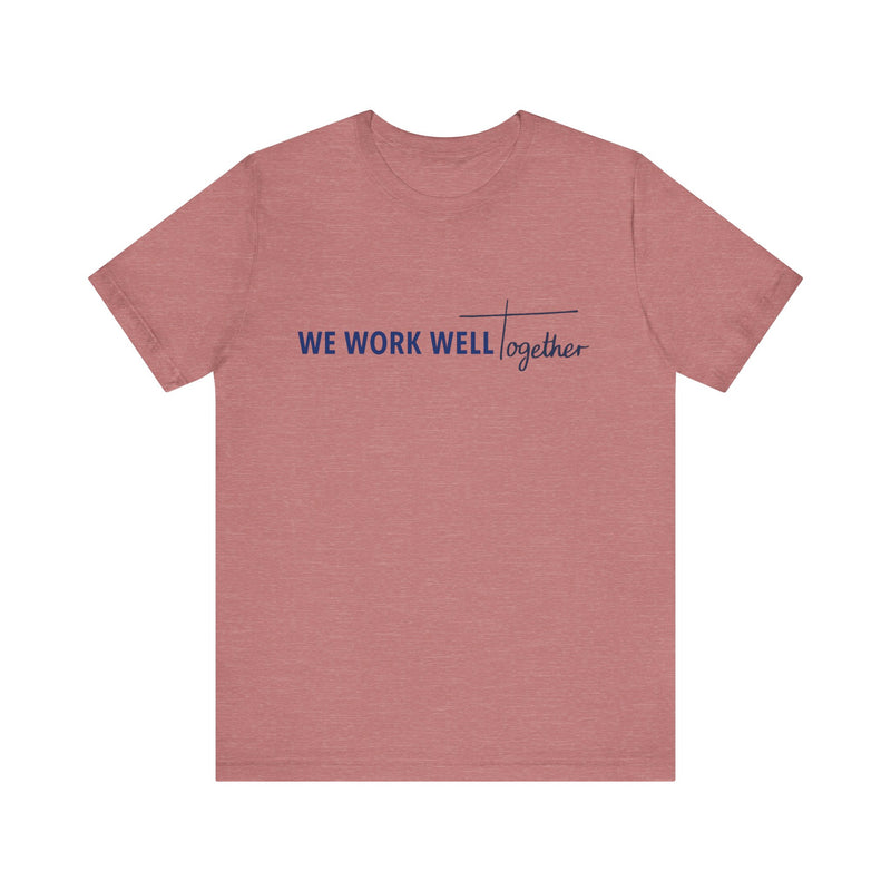 Typography shirt design reading “We Work Well Together” with a cross-inspired T, representing unity with Jesus.