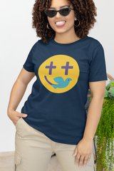 Woman wearing a navy Christian t-shirt with a smiley face design featuring purple cross eyes and a blue dove forming the smile.