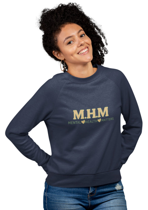 Person wearing a navy sweatshirt with 'M.H.M. Mental Health Matters' text on a white background