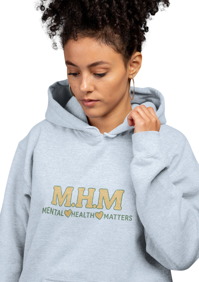 Person wearing a gray hoodie with 'Mental Health Matters' text