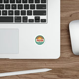 Laptop with a sticker on a wooden desk
