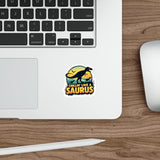 Laptop with a 'Chillin' Like a Saurus' sticker on a wooden desk