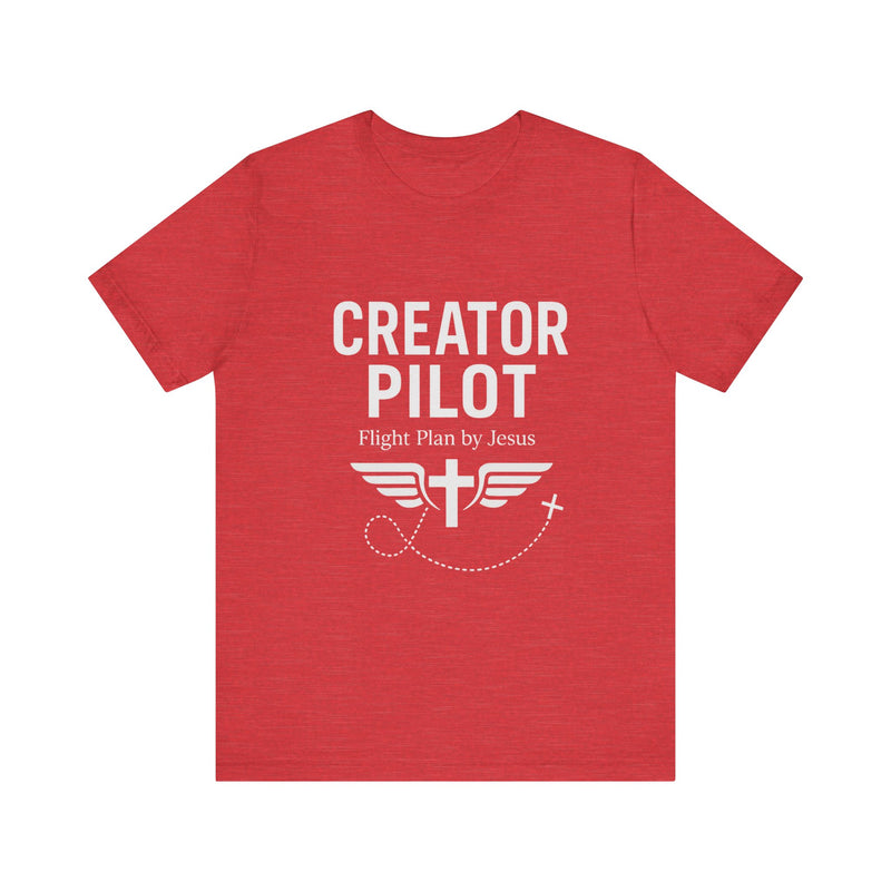 Faith-based t-shirt with “Creator Pilot” text, flight emblem with cross and wings, Christian apparel for Kingdom creators.