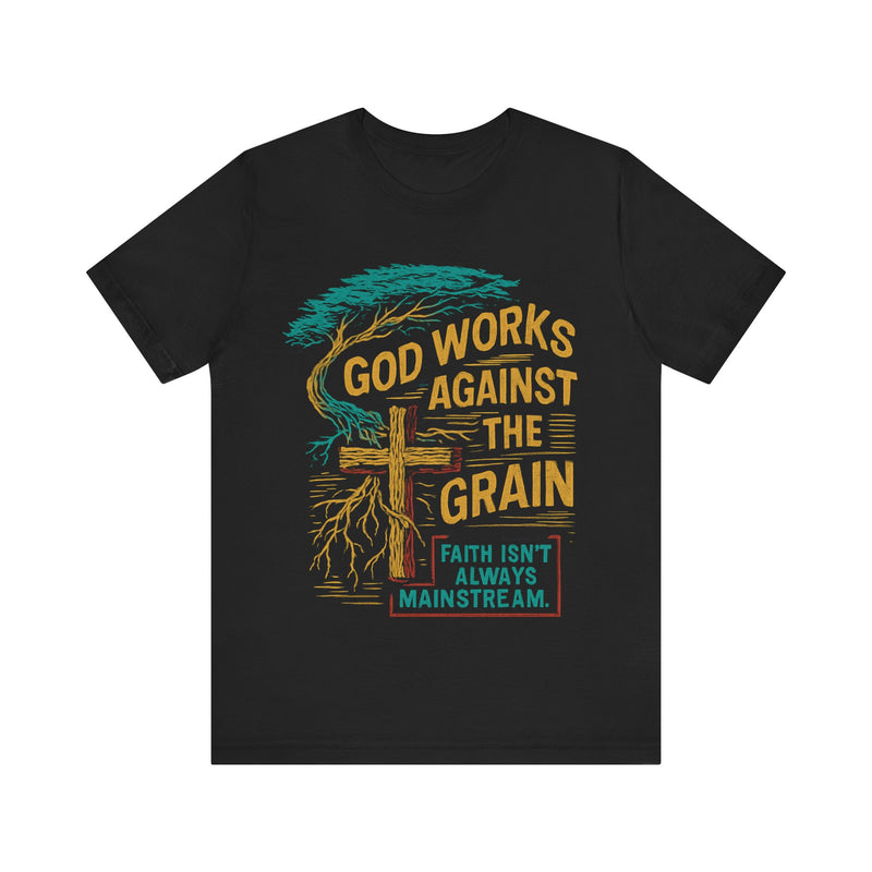 "Model wearing God Works Against the Grain Christian t-shirt in black, faith-based streetwear style by Klippette."