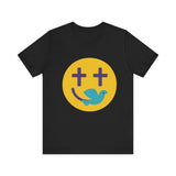 Woman wearing a navy Christian t-shirt with a smiley face design featuring purple cross eyes and a blue dove forming the smile.