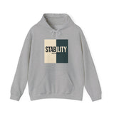 A hoodie with a bold, graphic design featuring the word “STABILITY” split across two contrasting colored backgrounds, with half the word on each side. Referenced scripture Isaiah 26:3 anchors the message visually and spiritually.